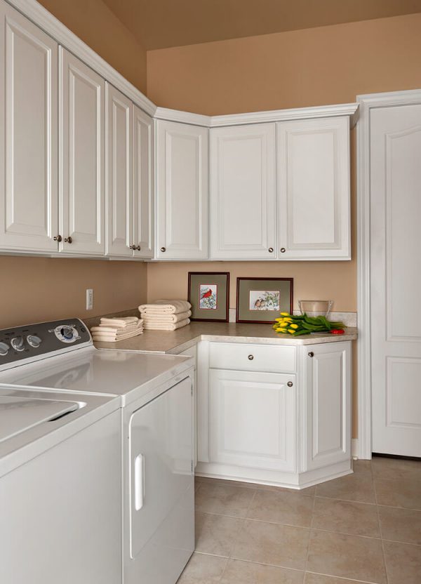 Laundry Room Designed in Traditional Style by KSI Kitchen and Bath